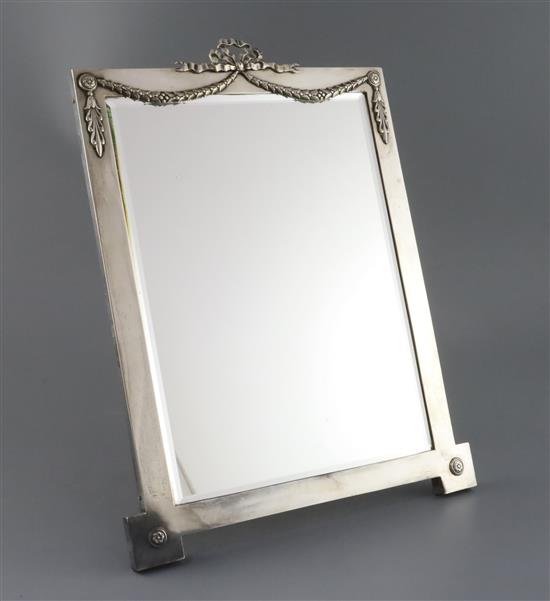 An Edwardian silver rectanglar easel mirror, London, 1904, with swag and ribbon surmount,